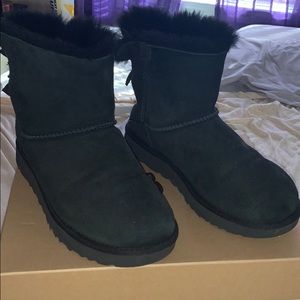 black ugg boots wit mini bows .